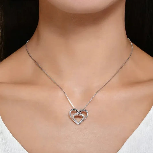 Garde-moi toujours dans ton cœur, car tu es toujours dans le mien. Collier « Deux cœurs à l'infini ».